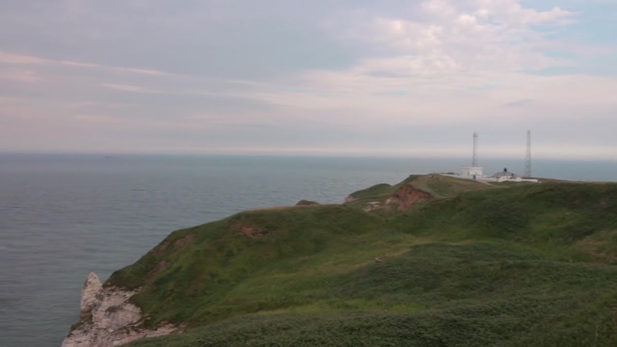 Flamborough Head coastline with dramatic storm clouds building overhead