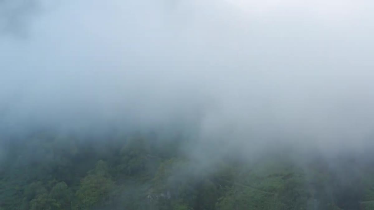 Mist returning behind location, light visible through clouds