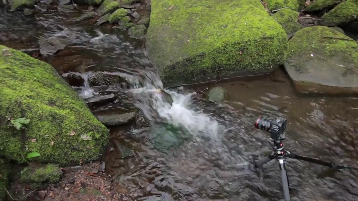 Camera settings showing f/16 aperture with exposure time approaching one second