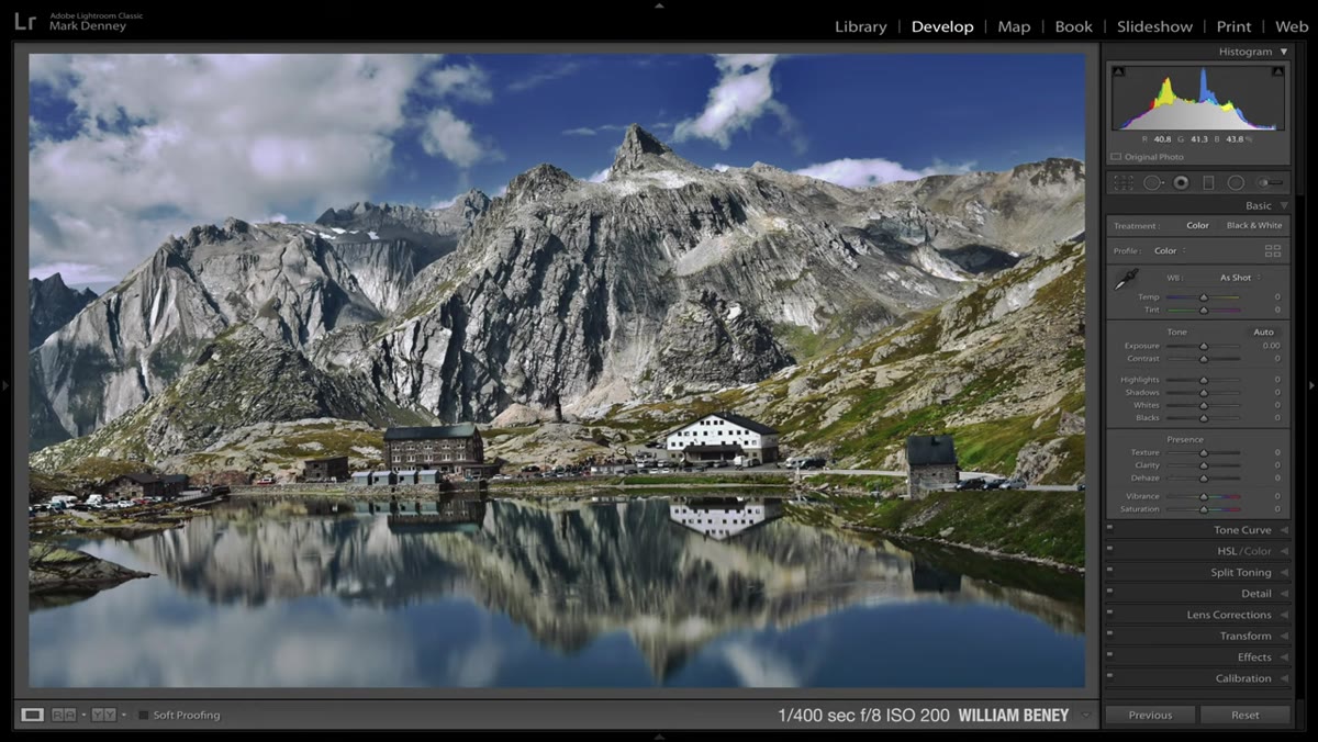 Auto-straighten tool correcting a tilted mountain reflection image
