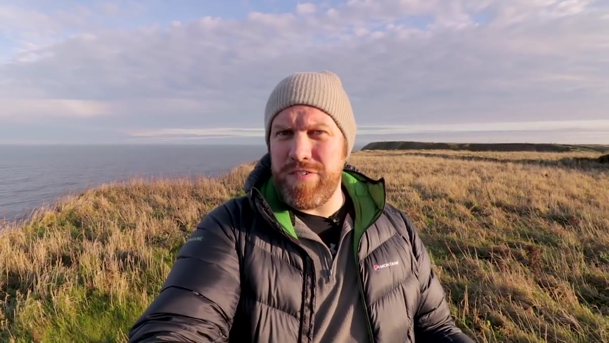 Photographer explaining his failed morning plan to camera